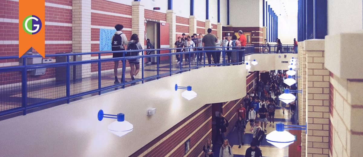 Students walking the halls in high school.